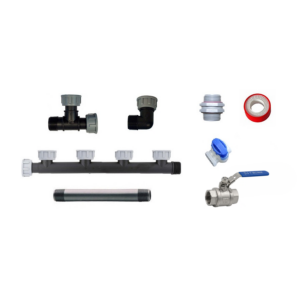 Assorted plumbing fittings and valves on white background