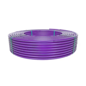Coiled purple irrigation pipe secured with green ties
