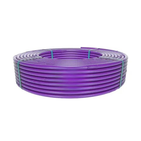 Coiled purple irrigation pipe secured with green ties